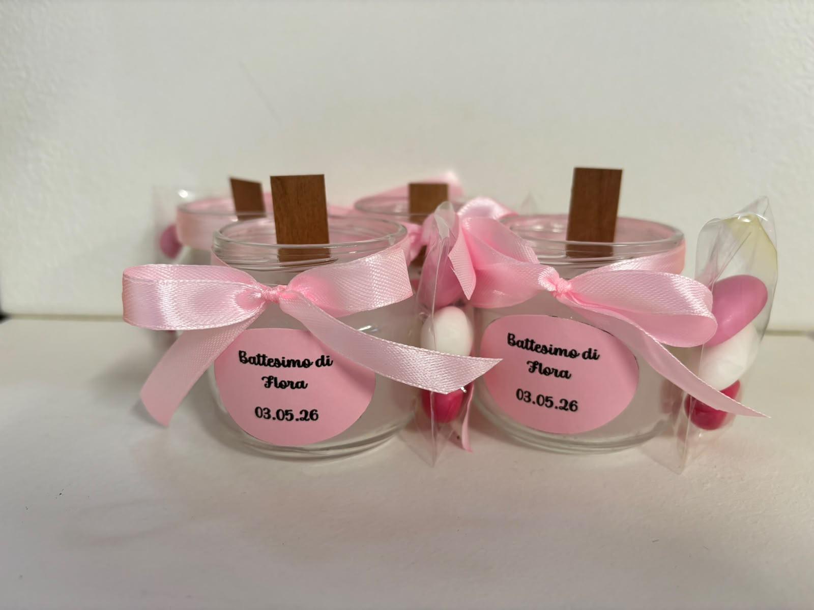 Vasetti con nastri rosa per battesimo